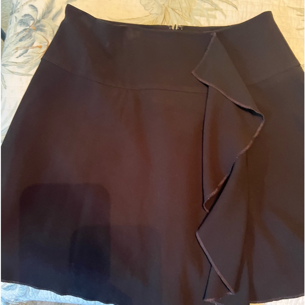 Shine star Black Skirt with off center ruffle Size large but fit's medium.